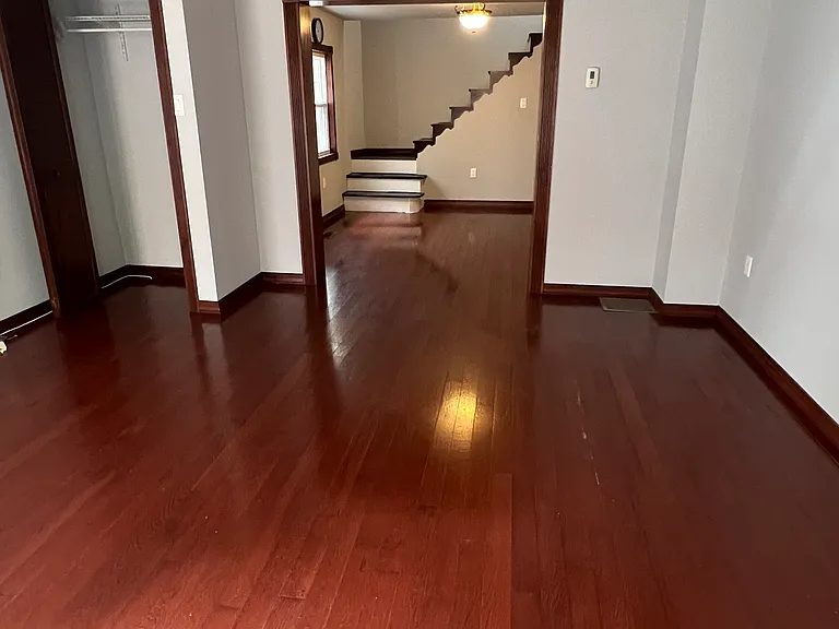 In the living room, looking at the dining room.
