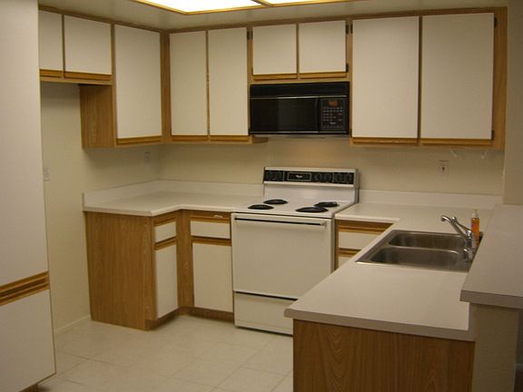 ...kitchen is roomy and modern...