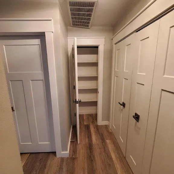 Hallway with Laundry and Linen Closet