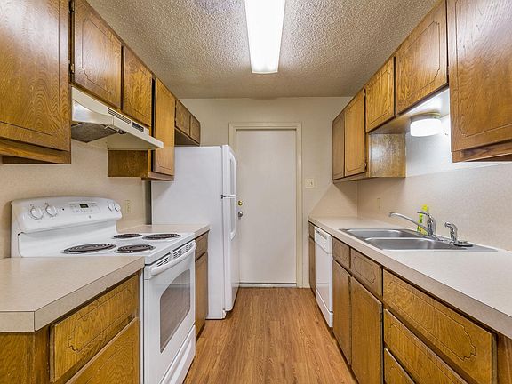 Faux hardwood floors in the kitchen and bathrooms!