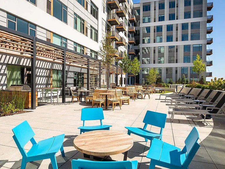 Gather with friends or unwind solo on Eleven33's outdoor terrace, featuring modern seating, sunny views, and spaces designed to make every day feel like a getaway.