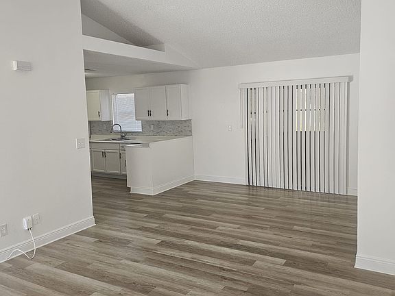 LIVING ROOM - NEW WATERPROOF LAMINATED FLOOR