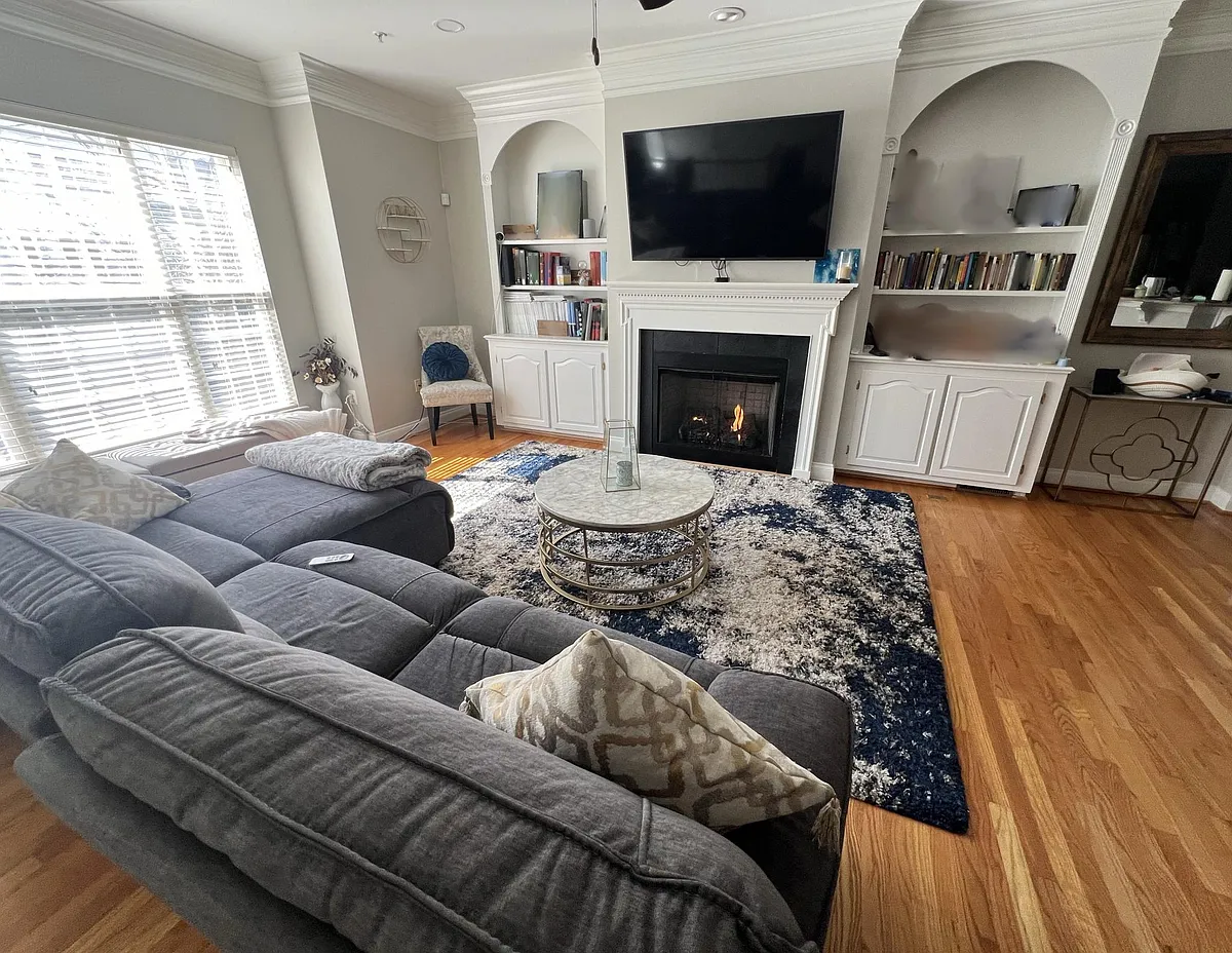 Beautifully sunlit living room with gas fireplace - 5065 Minda Ct