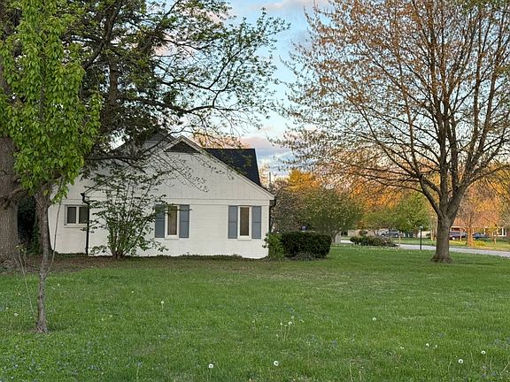 West side of house and lot