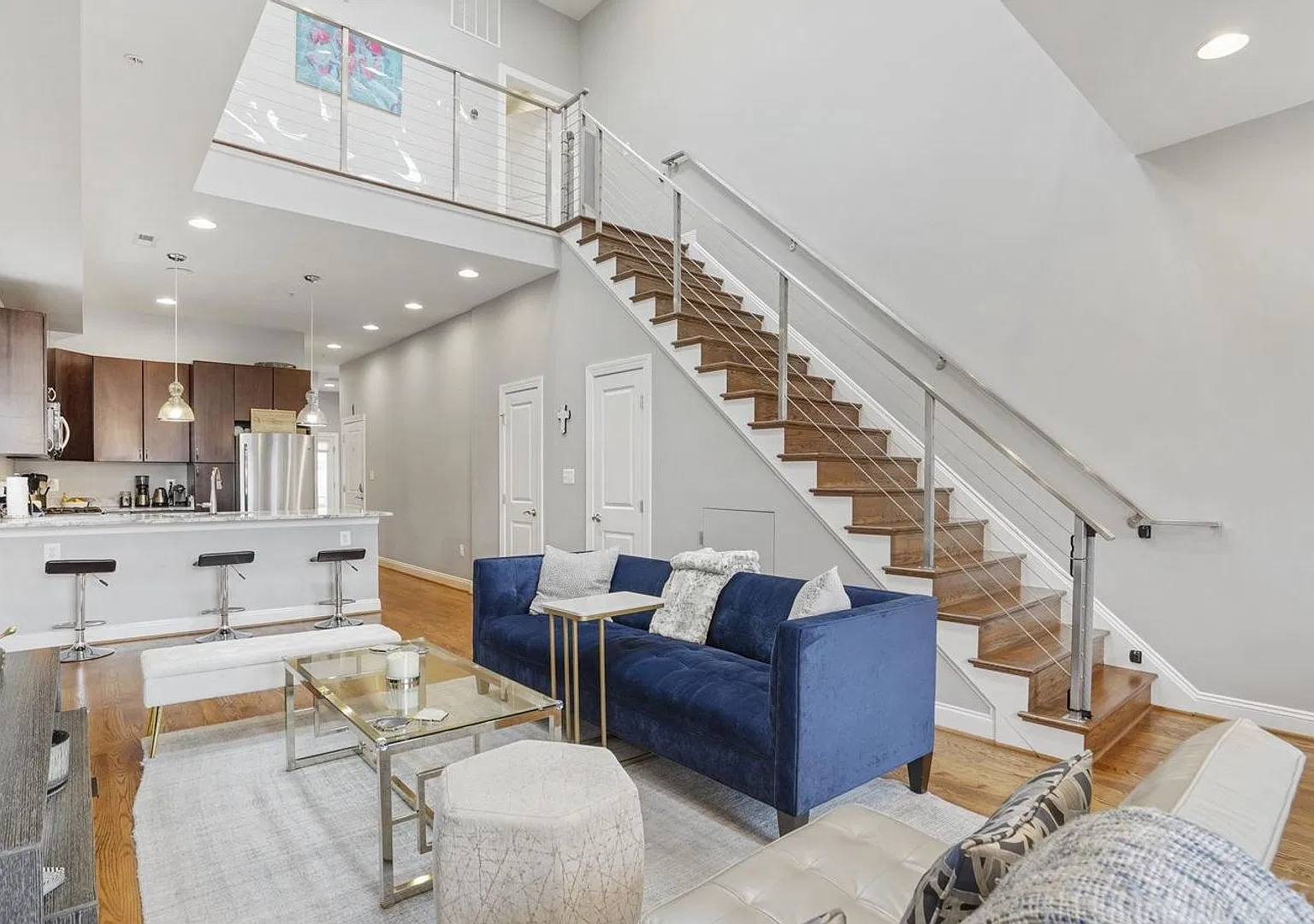 Stunning 3-bedroom, 2.5-bath two-level penthouse with den in historic Shaw, featuring soaring cei... — Photo 3