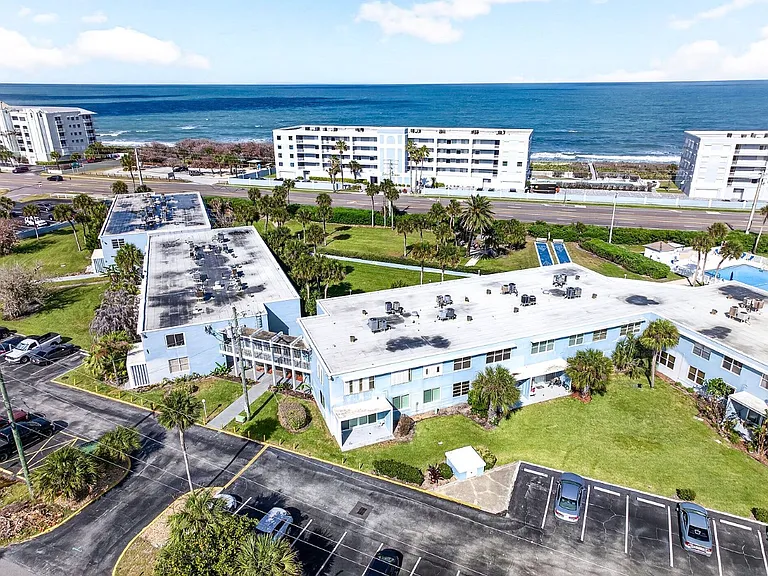Drone view - looking East (complex is situated on the the west side of A1A and a few hundred feet from the breaking waves).