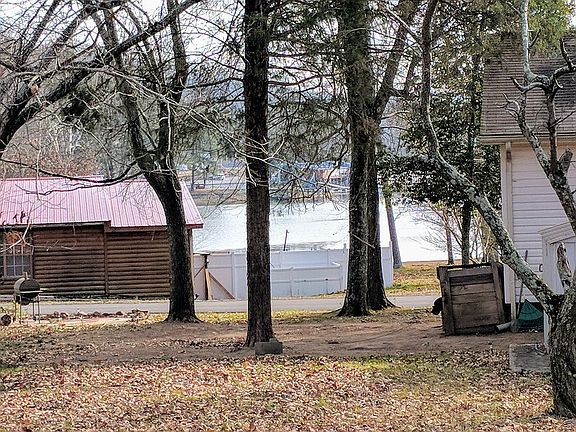 View from driveway of brown house