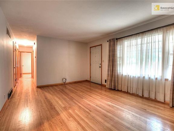 Refinished hardwoods in living room