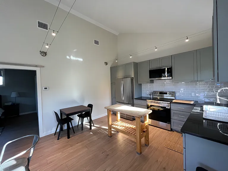All new appliances, above stove microwave with ventilation to the outside