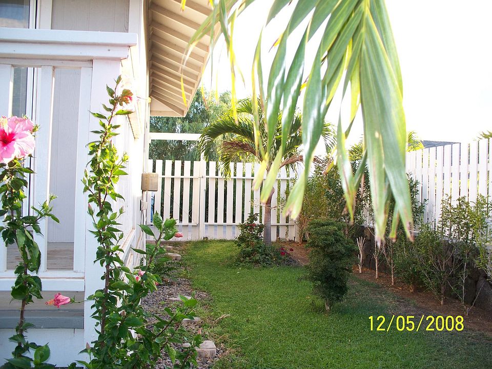 Hawaii's flora inside white fence