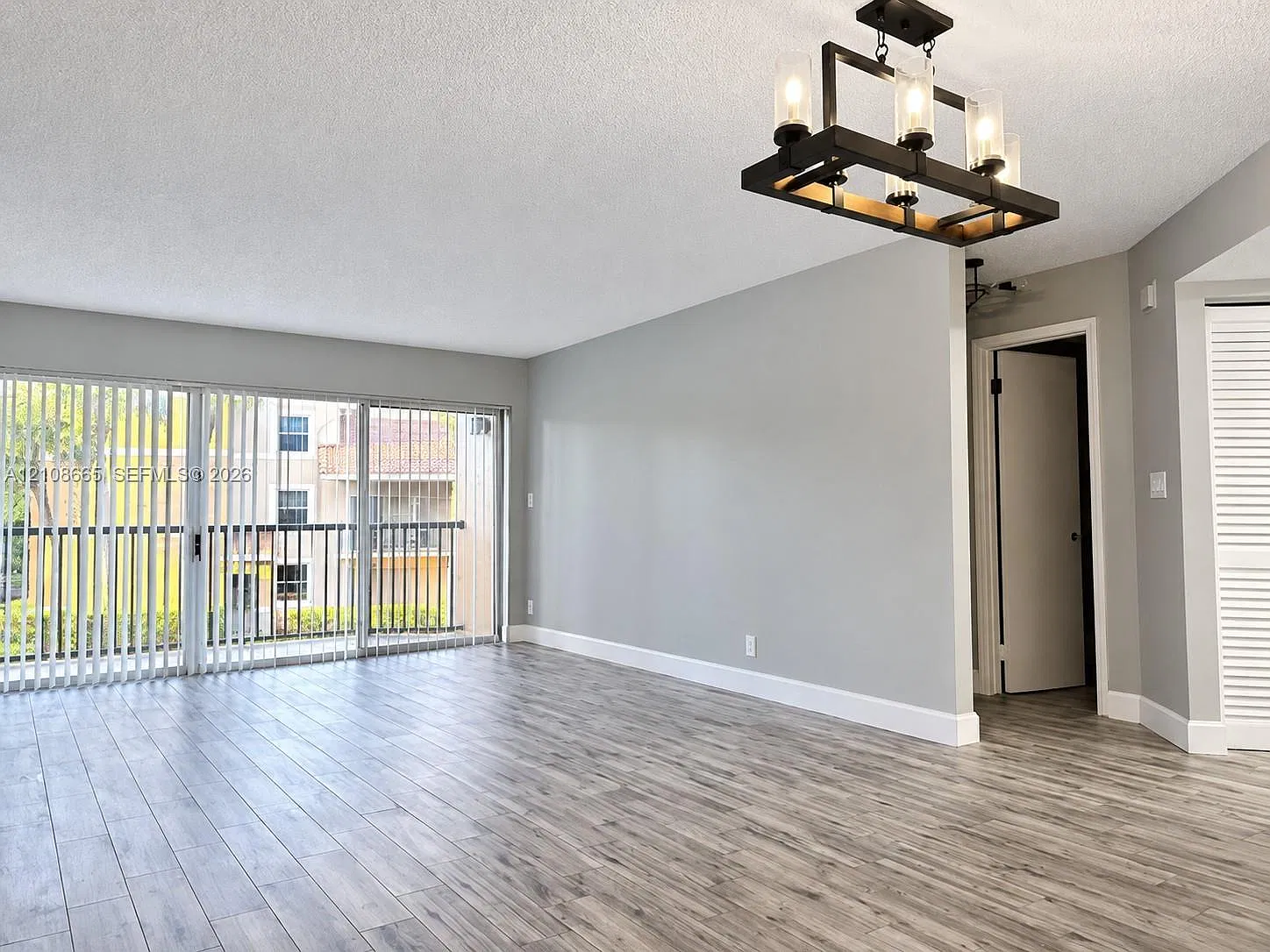 8955 Wiles Rd — Photo 3