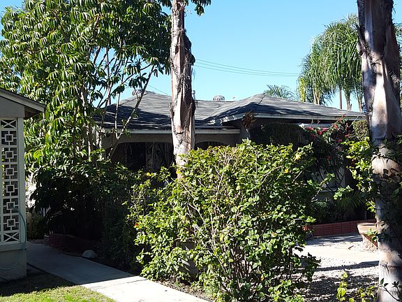 Walkway to front street, and a view of the front house.