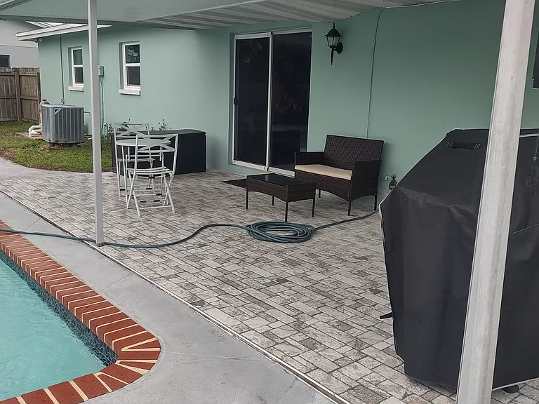 Covered patio w cobbled tile for non-slip easy cleaning