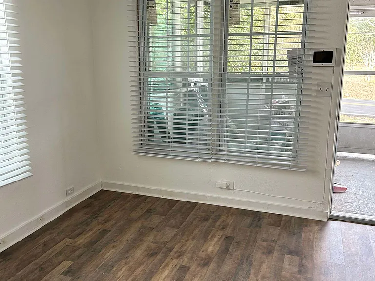 Front entry (no furniture). 2 inch blinds throughout with luxury plank flooring.