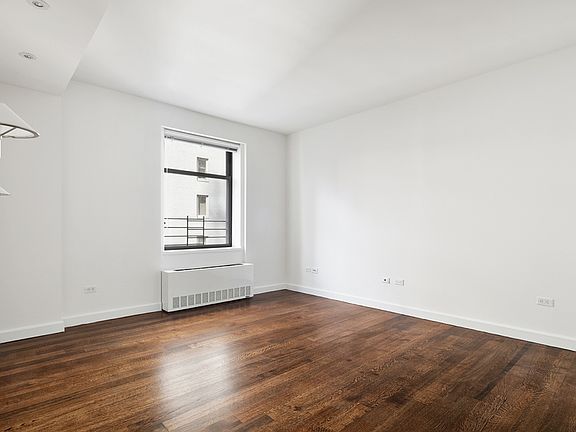 5th image of 100 W 58th St APT 13F