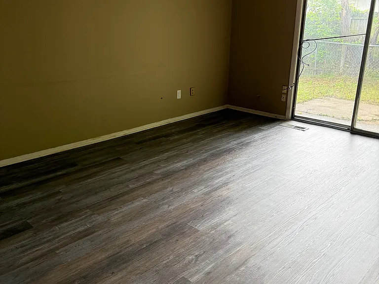 Large living room
Sliding doors open onto fenced backyard
