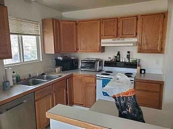 kITCHEN LAYOUT stove, dishwasher, fridge included actual kitchen may be mirror imaged