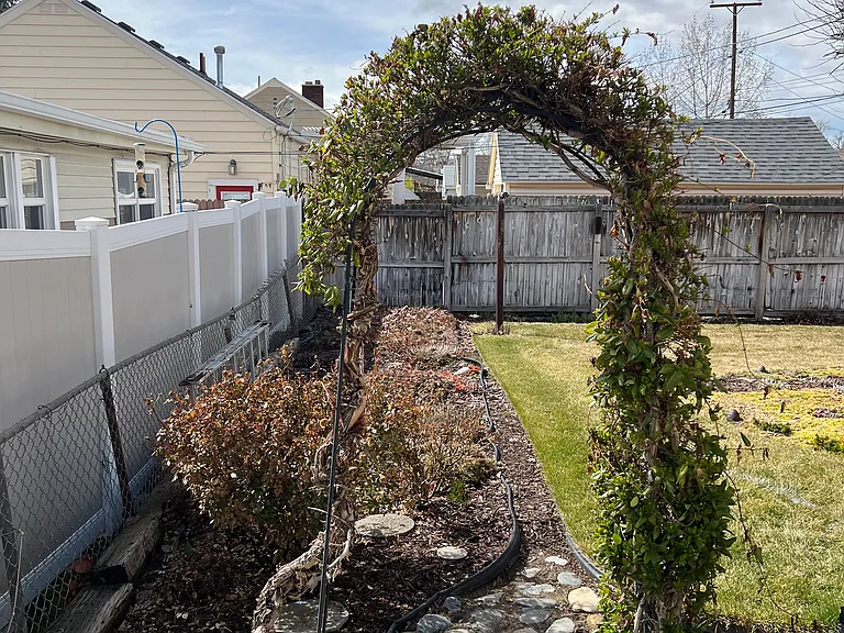Backside of townhouse looking at backyard