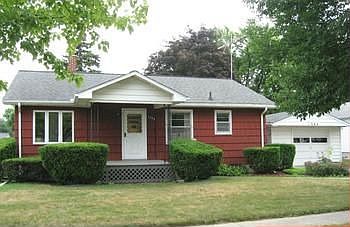 Solid 3 bedroom home set in quiet south end neighborhood. Built-in China cabinet in kitchen. Newer w