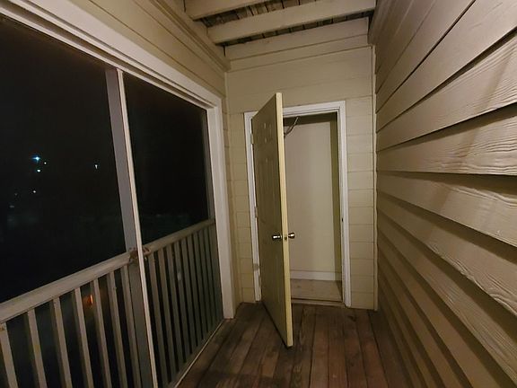 Screened Patio with external storage closet