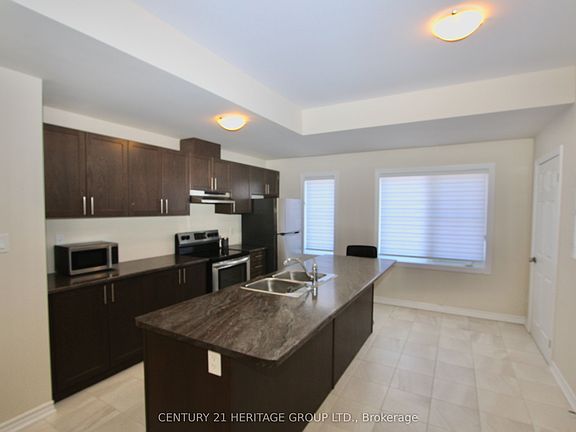 3rd image of 677 Park Rd N #13