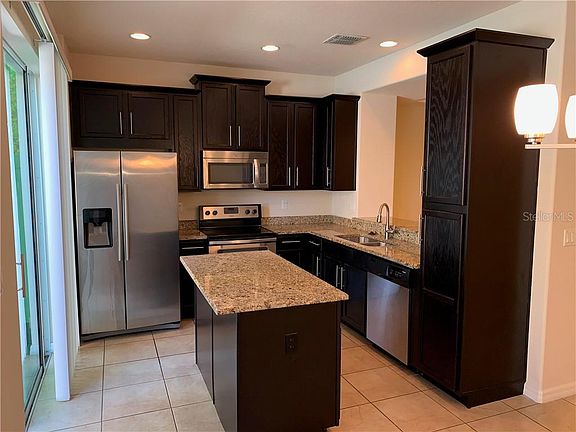 5th image of 9613 Silver Buttonwood St
