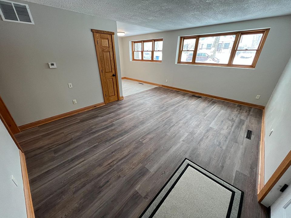 View from main entrance into living room. Windows, windows, windows!