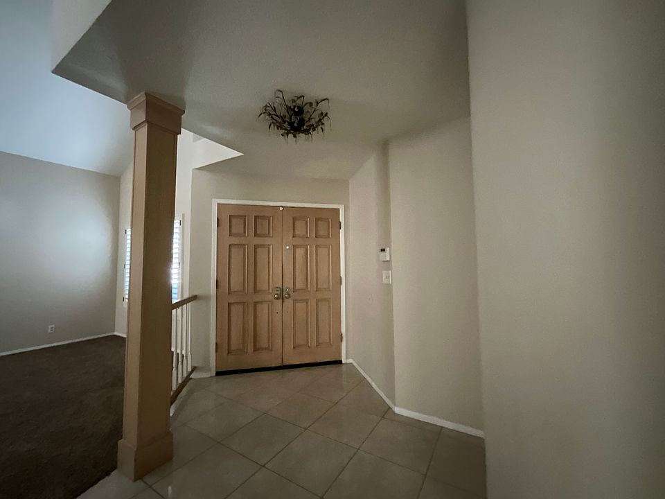 Front door and entry inside the house