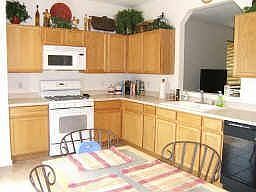 open and bright tiled kitchen