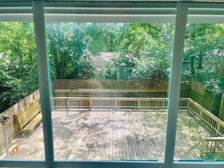 Deck and back yard viewed from the sun room windows