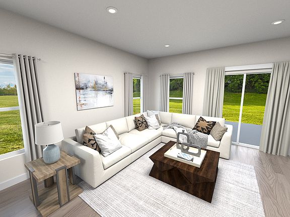 Living area with views of covered patio.