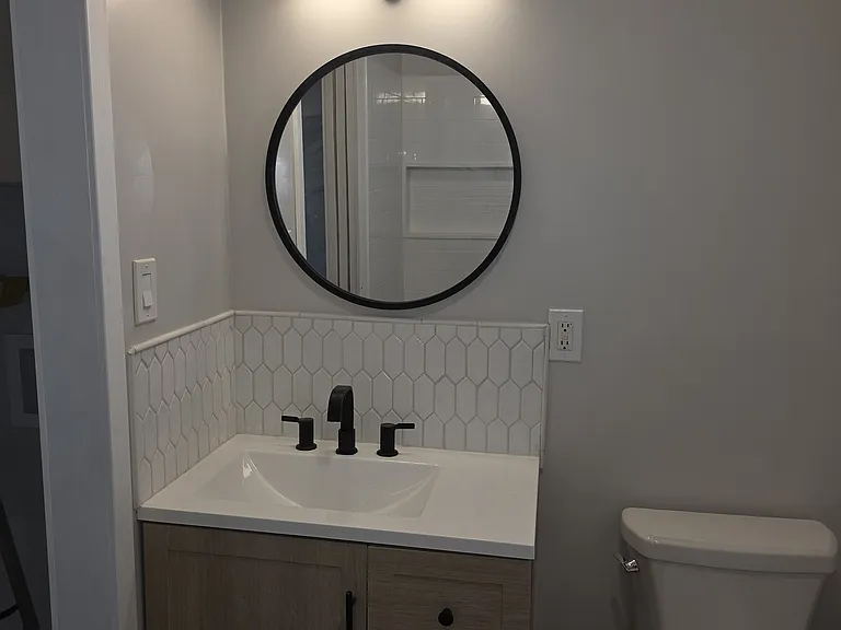 Bathroom sink and toilet