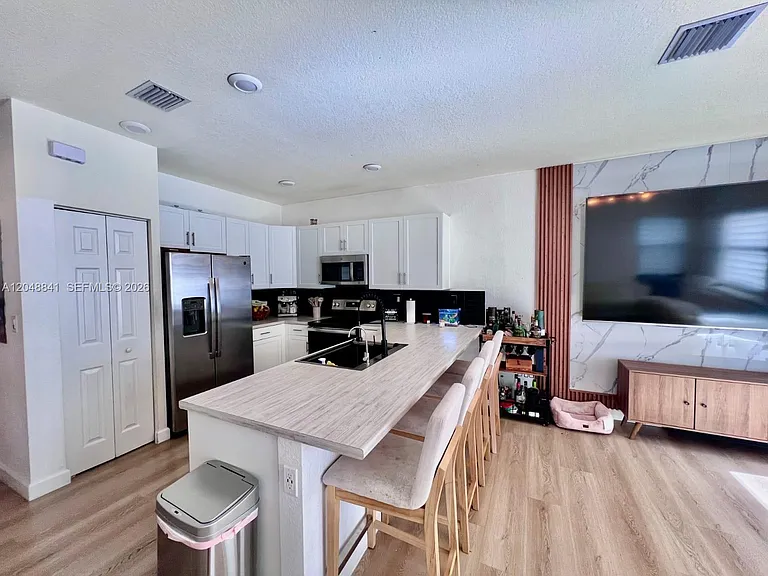 10939 W 32nd Ln — Photo 5