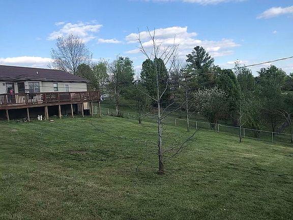 Partially fenced in backyard