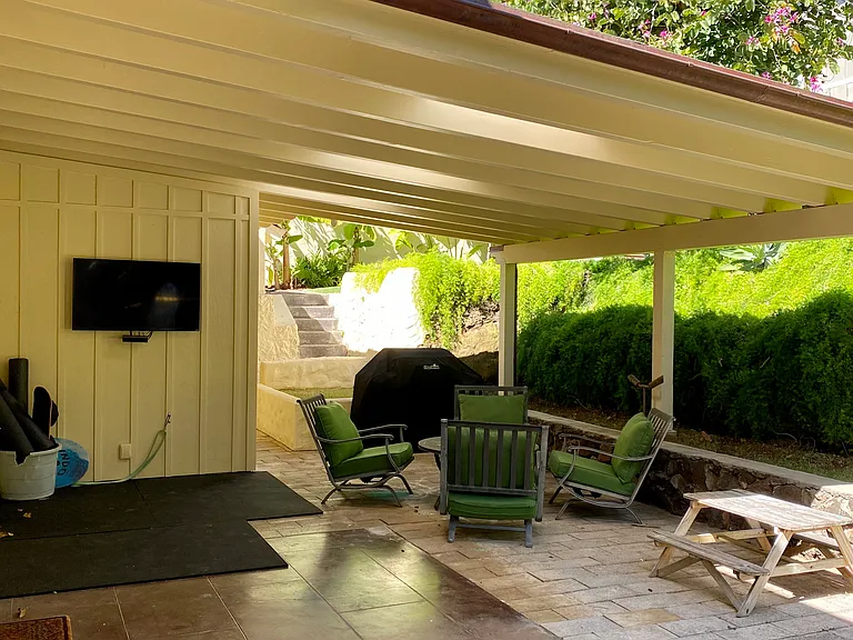 A spacious covered lanai off the living room provides a quiet place to enjoy outside.