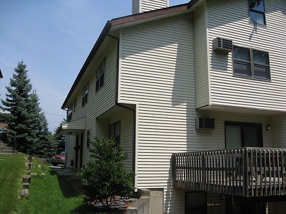 Rear of building (deck included, lower level is basement, an