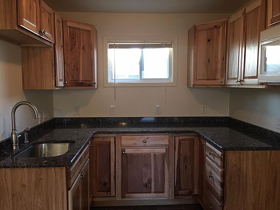 Newer Cabinets, Granite Countertops and flooring
