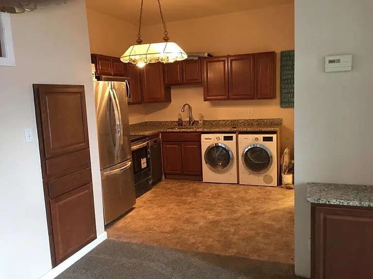 Kitchen with in unit laundry