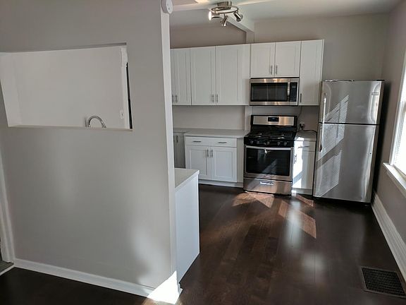 Living room, into kitchen