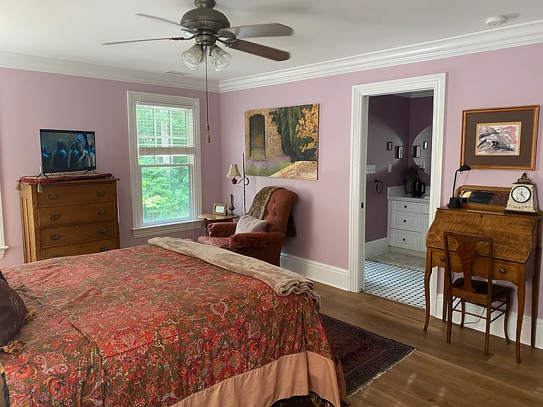 En suite large purple bedroom