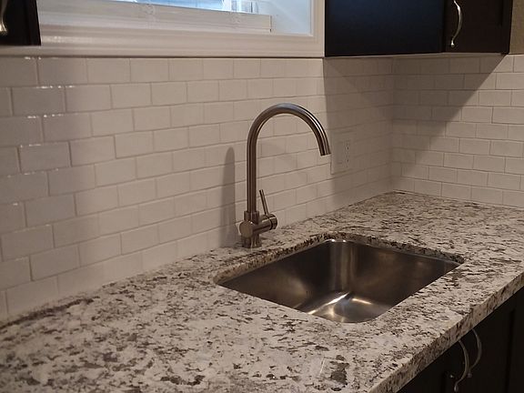 Granite countertop, kitchen sink