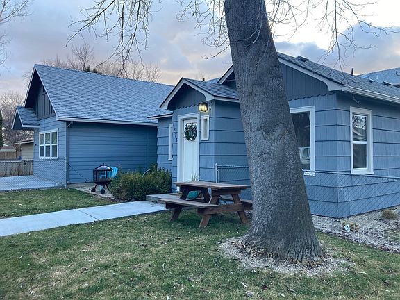 Front of duplex structure showing both units. Unit on right side is available for lease.
