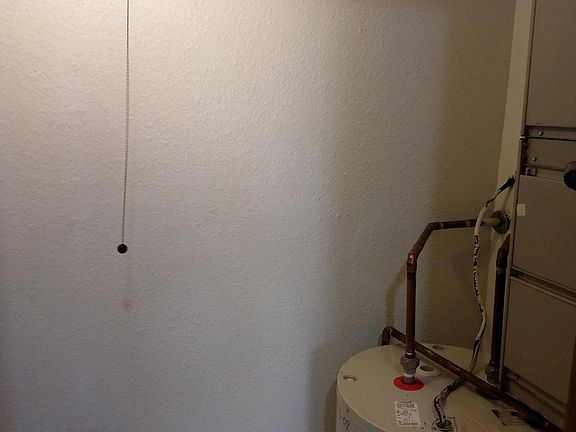 EXTRA STORAGE WHERE WATER HEATER AND FURNACE IS