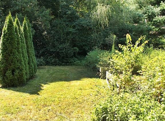 Raised garden beds near home site.