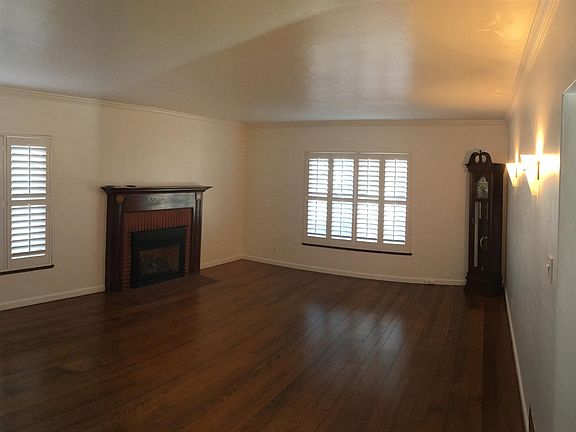 Formal living room with gas fireplace