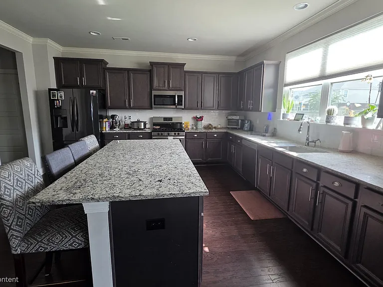 7943 Gristmill Dr — Photo 2