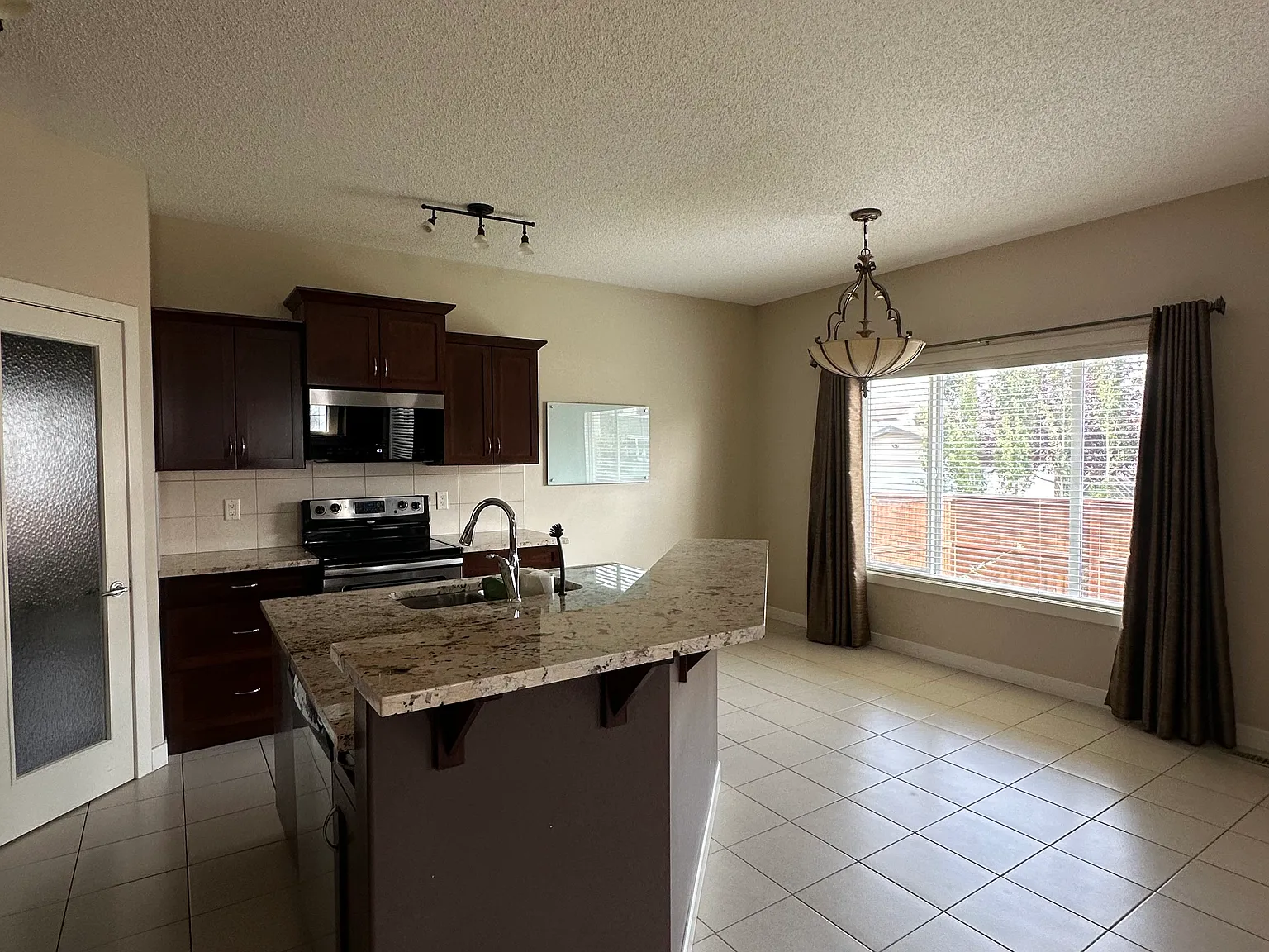 Luxstone Blvd SW, Airdrie — Photo 3