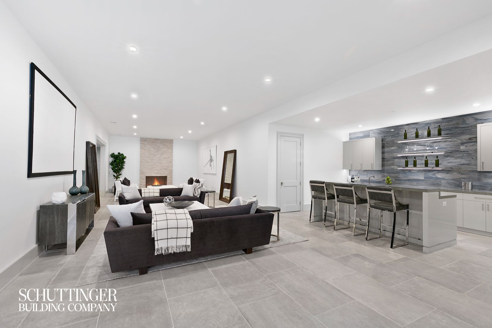  Lower Level Main Rec. Area featuring Kitchenette and 11'H Ceilings