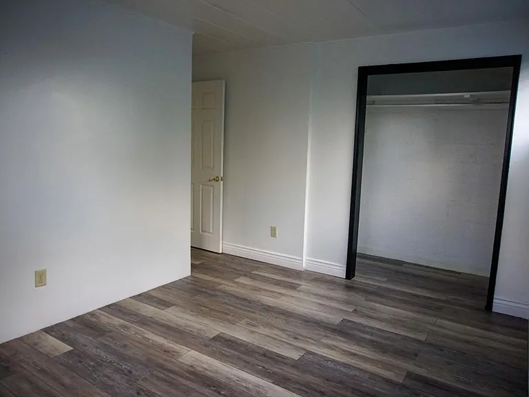 one of the 3 bedrooms