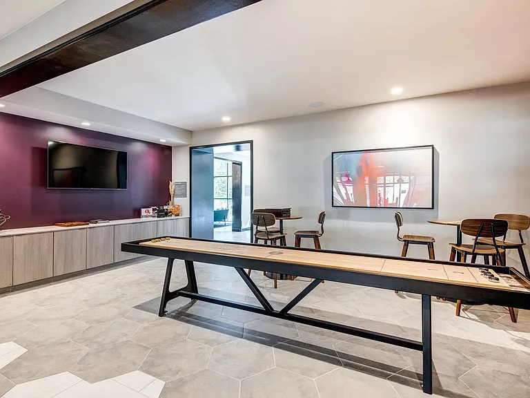 Challenge your friends to some leisurely competition with a game of shuffleboard.